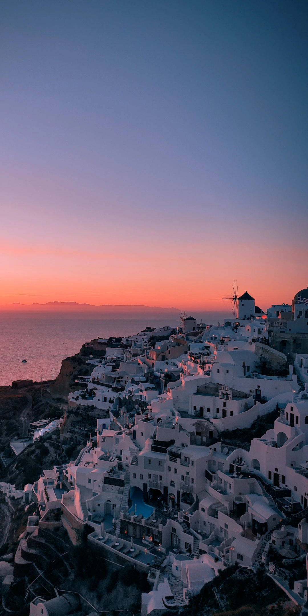 Whitewashed houses above the sea in Santorini